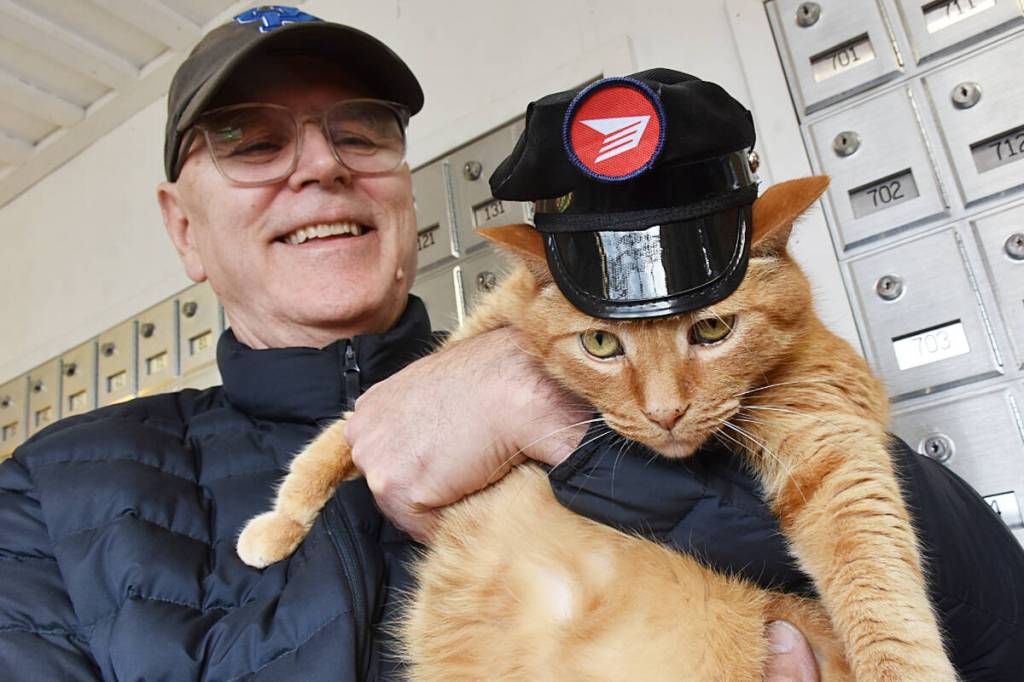 Whonnock resident Paul Stanley holds Sid, the honorary postmaster for the Whonnock Post Office. (Colleen Flanagan/The News)