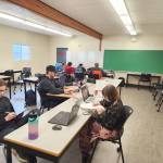 The two teams work on their projects during the Food and Farming Hackathon. (North Island College/Submitted)